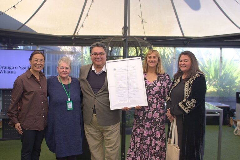Te Hā Oranga o Ngāti Whātua: Anthony Thompson (Ngāti Whātua) with the research team following the signing of the Kia Manawaroa Kawenata.