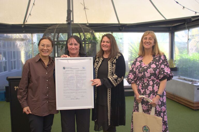 Te Hiku Hauora: Maria Baker (Ngāpuhi, Te Rarawa) with the research team following the signing of the Kia Manawaroa Kawenata.